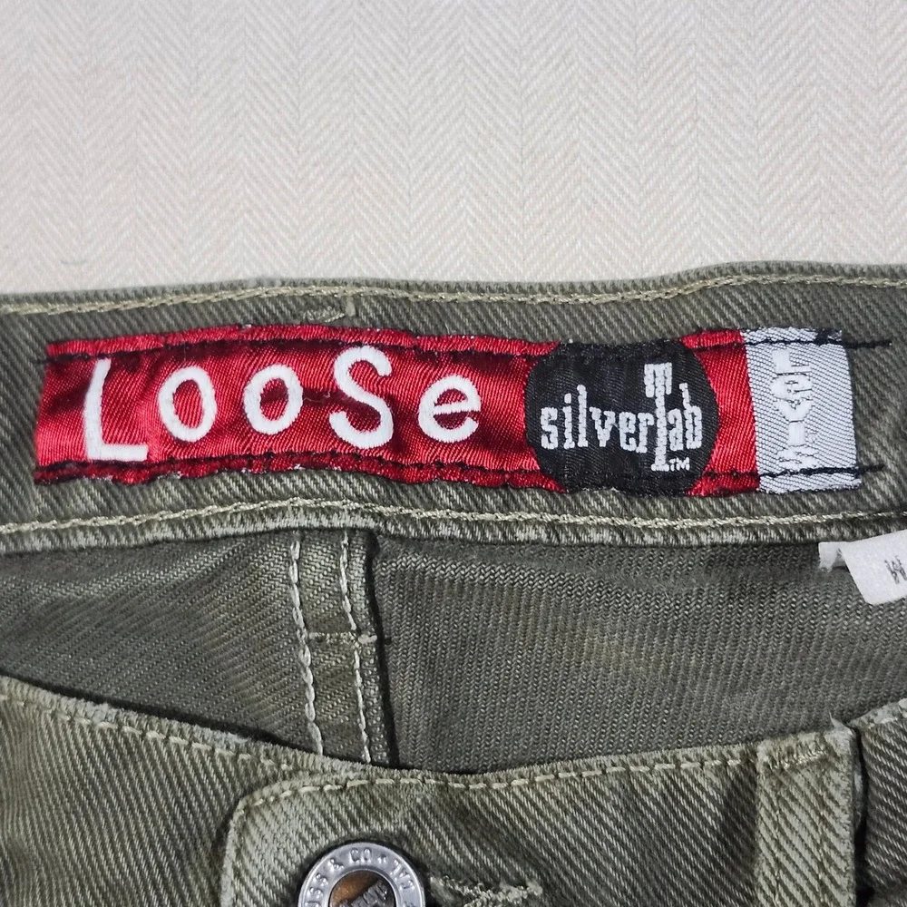 Vintage Levis SilverTab Loose Olive Green Jeans Made in USA 31x32 501-0596